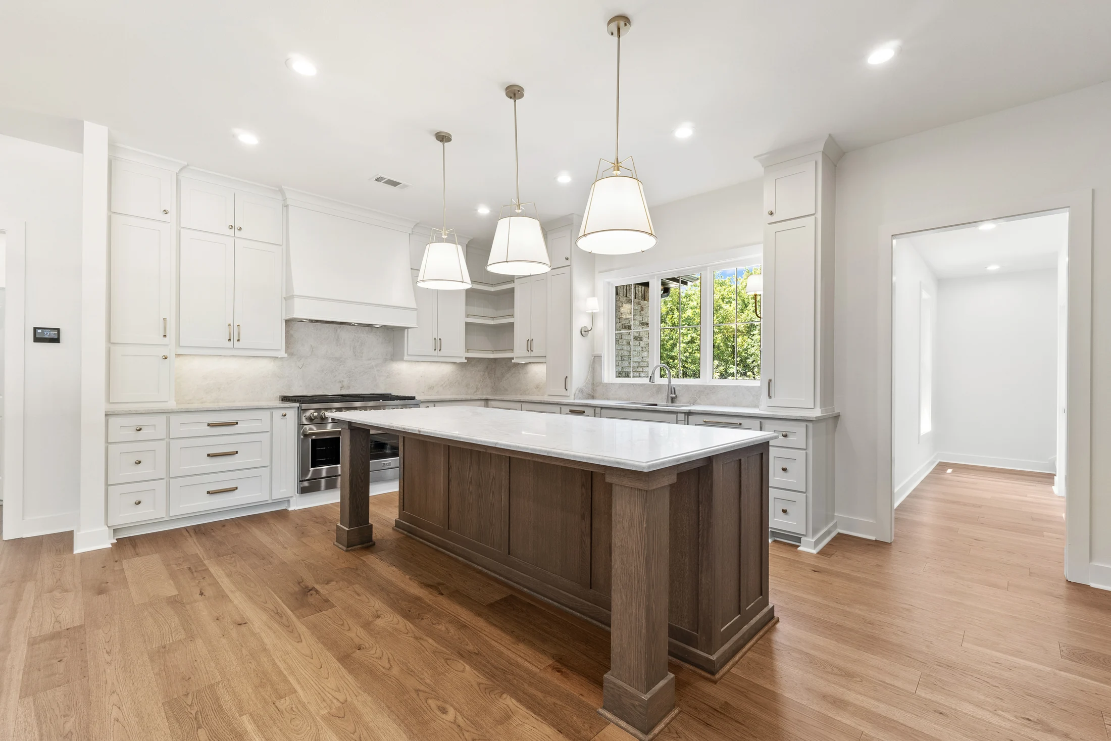 Bright custom kitchen photographed for EM Builders